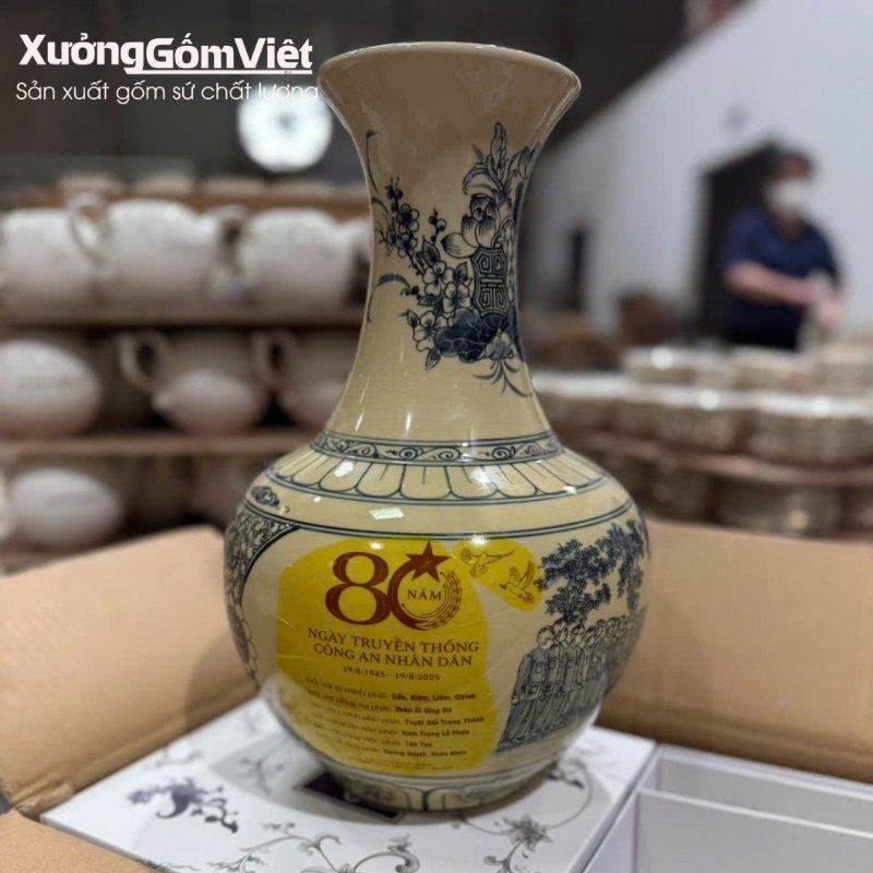 binh-hut-loc-in-logo-ky-niem-80-nam-ngay-cand (1)